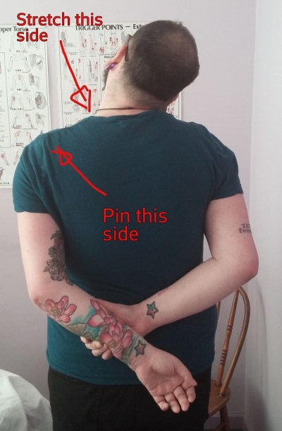 Neck stretch shoulder pin